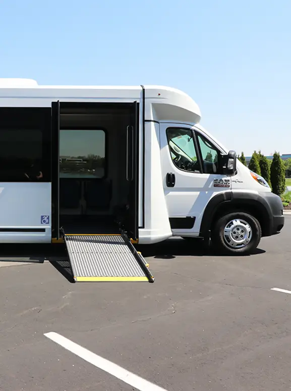 Handicap accessible vehicles in New Orleans white wheelchair accessible bus